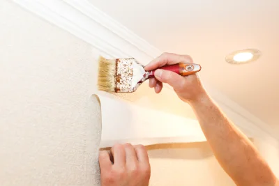 Pose de papier peint à Couret — revêtements muraux et toiles de verre